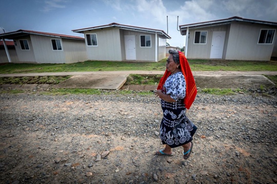 Woman walks through street of Panama.
