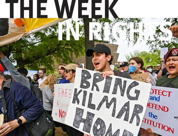 Protesters hold sign reading "Bring Kilmar Home".